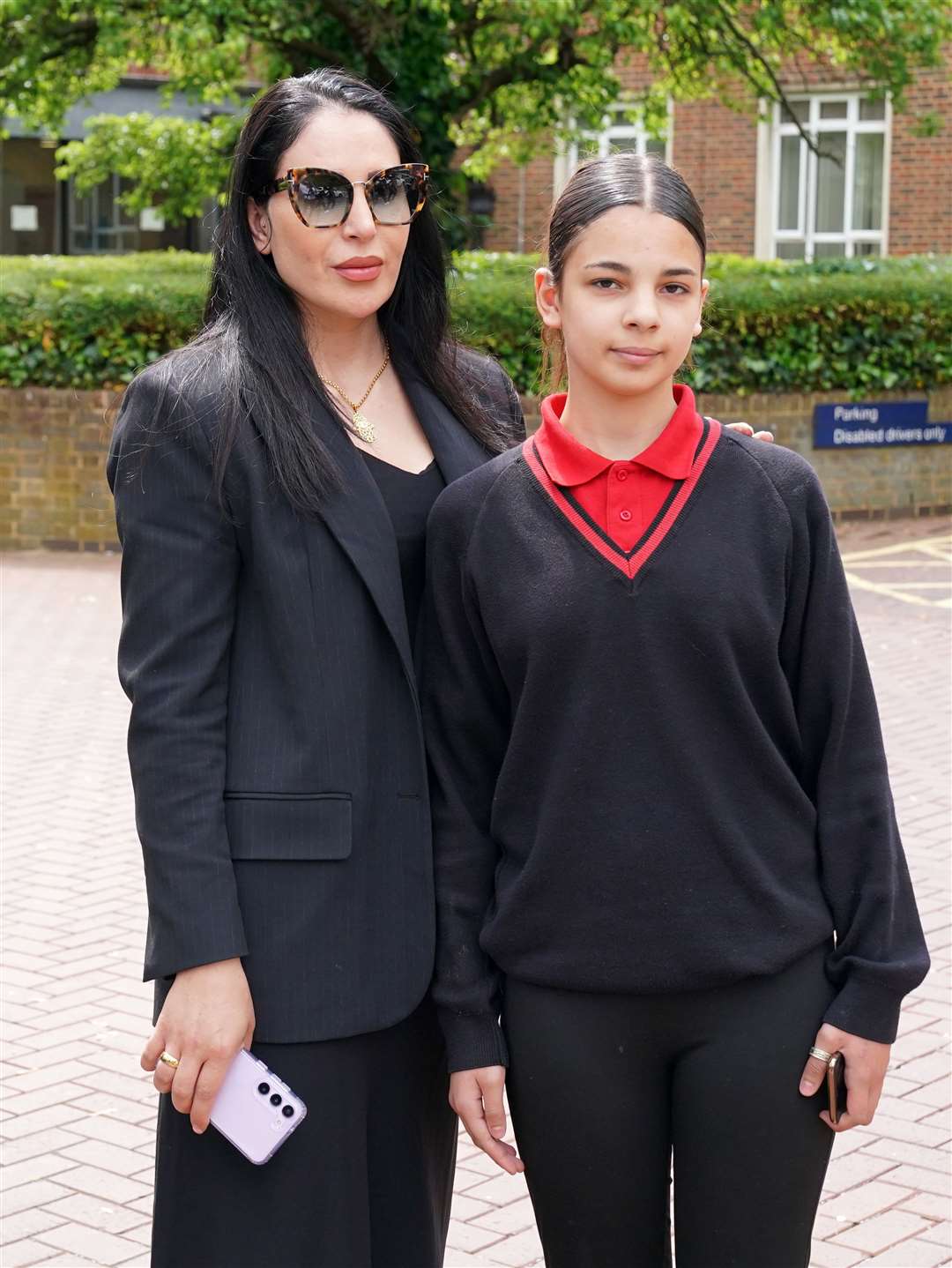 Yagmur Ozden’s sister Maya Kodsi, left, and Ms Ozden’s daughter Melek attended Kazem’s sentencing at Isleworth Crown Court in May (Jonathan Brady/PA)