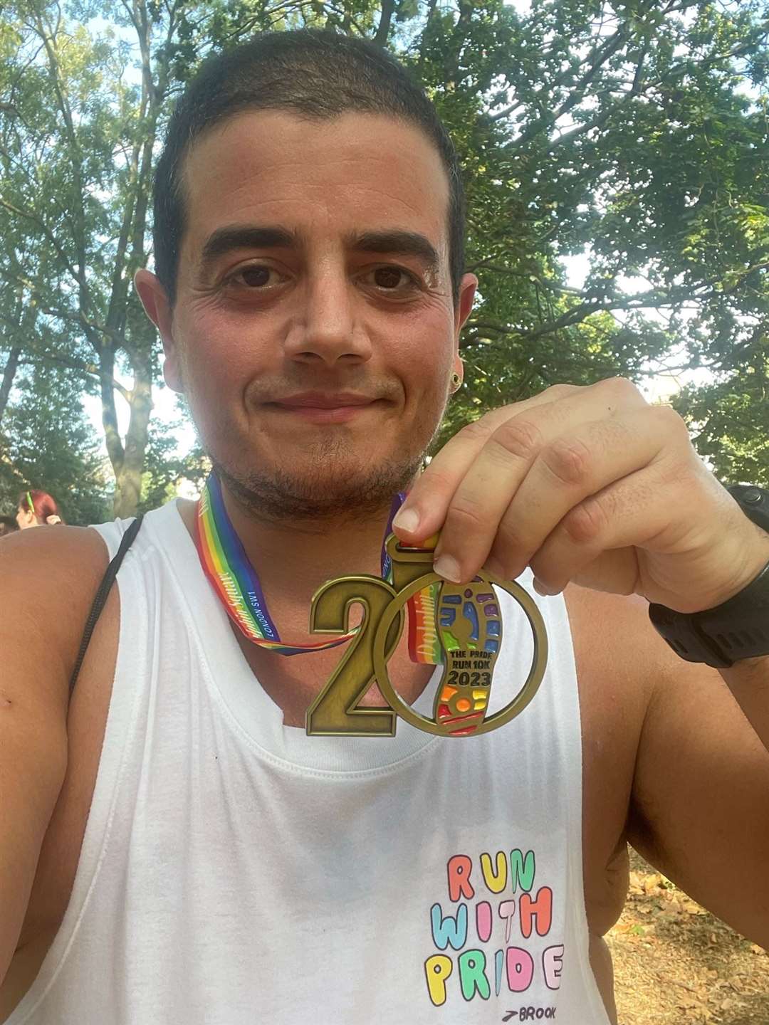 Cel Smith, pictured with their medal for the 2023 Pride Run 10k, said they feel it is important to be ‘visible’ as an LGBT+ person (Handout/PA)