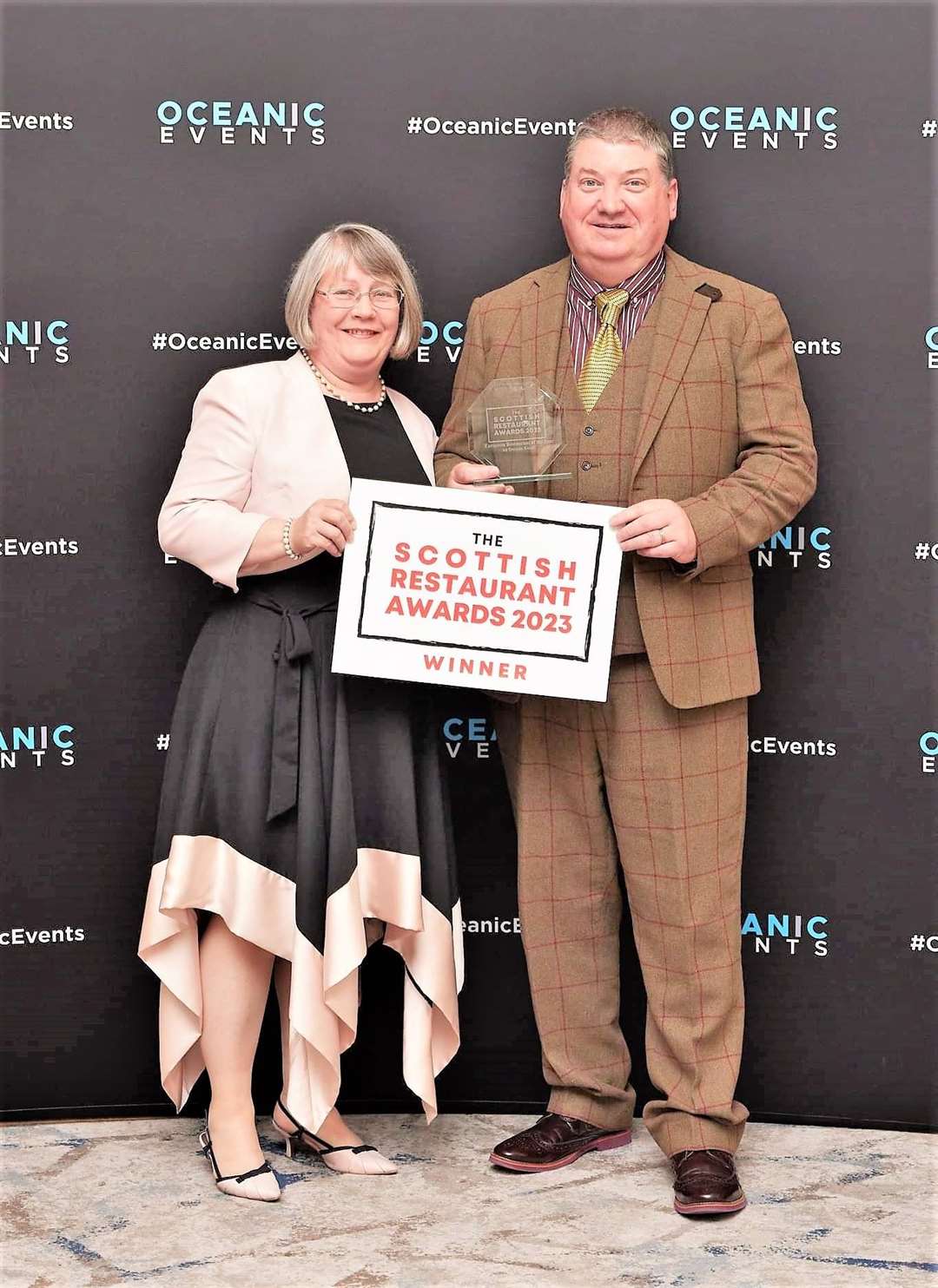 Bydand restaurant in Thurso won the award for European Restaurant of the Year. Brian Gordon is pictured with his wife Angela at the prestigious event in Glasgow.