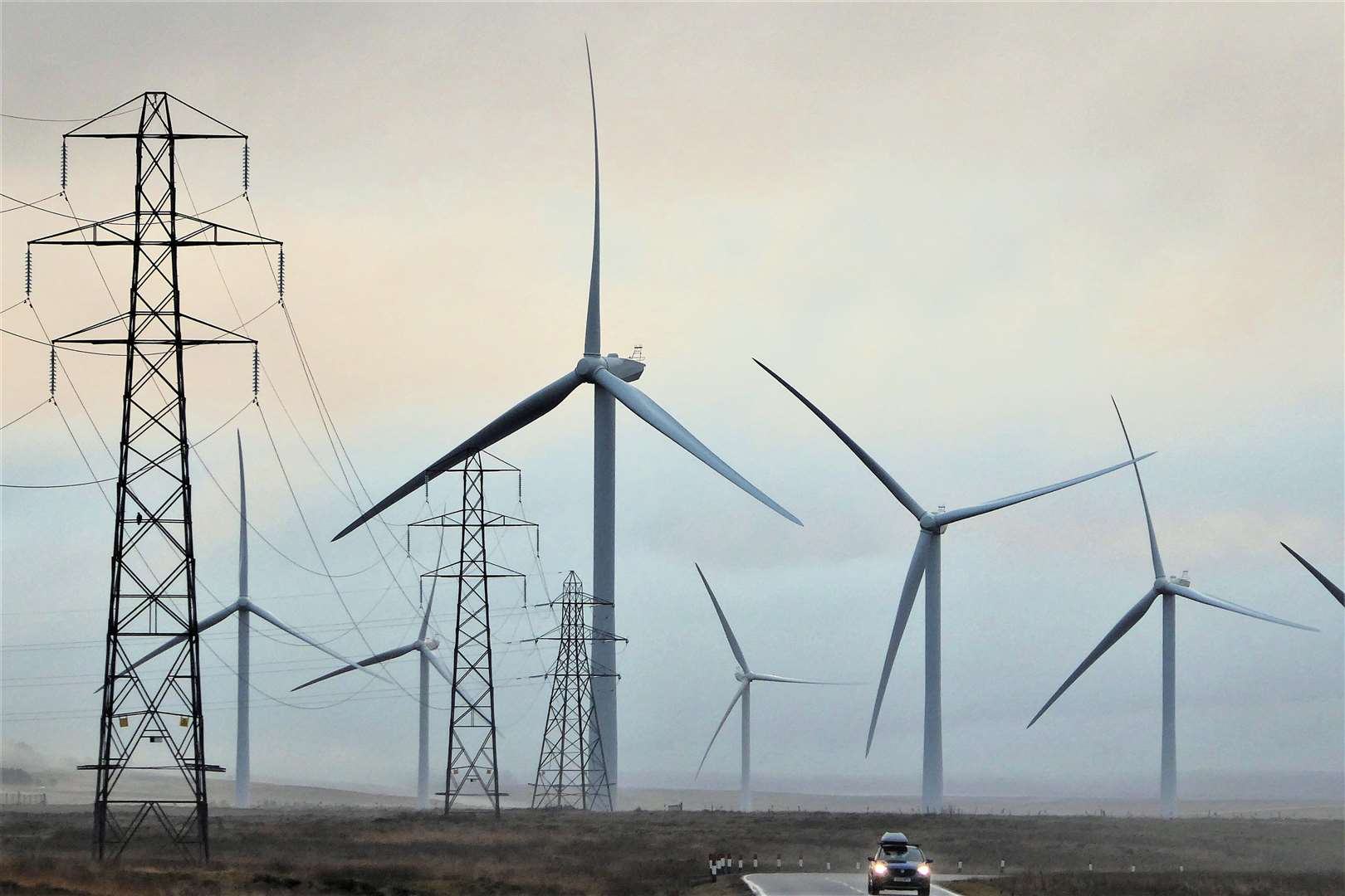 Wind turbines and pylons at the Causewaymire area. Cllr Reiss warns that Caithness may soon be transformed from a rural landscape to an industrial one. Picture: DGS
