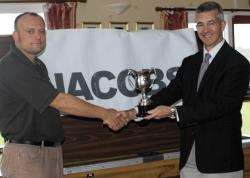David Craig, divisional director of Jacobs (right) presents Reay Golf Club’s Summer Cup to winner Lee Parnell.