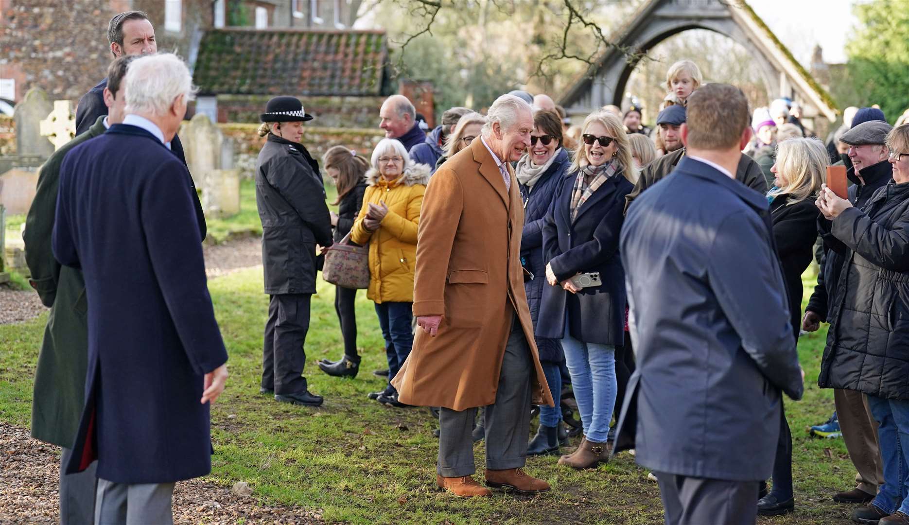A group of well-wishers gathered to greet the King at Castle Rising Church in Norfolk (Joe Giddens/PA)