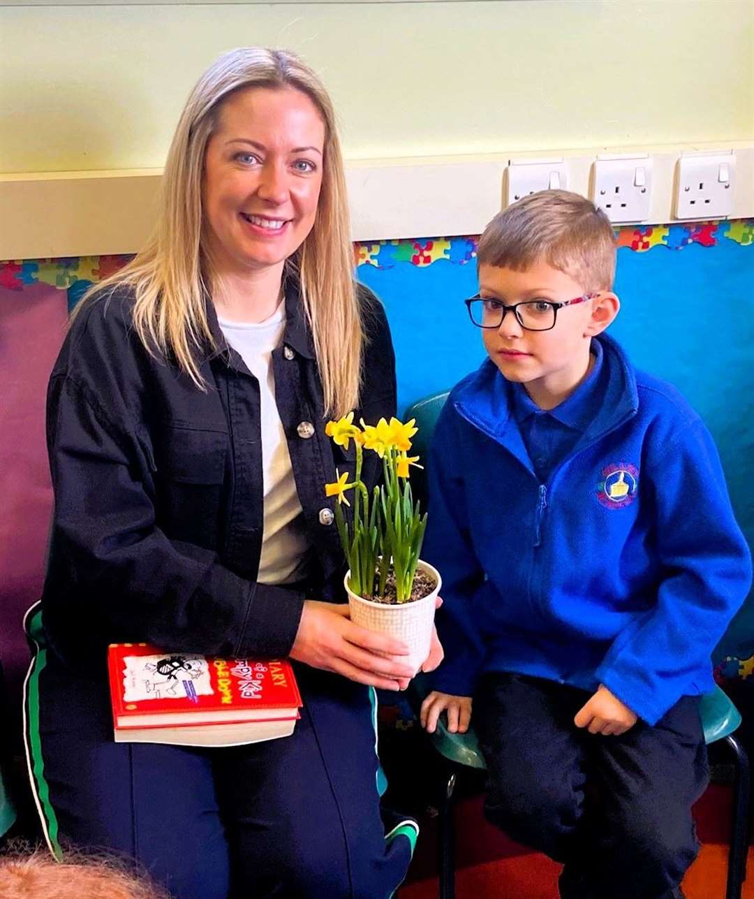 The pupils also gave each reader some daffodils as a thank-you for coming in to read to them.