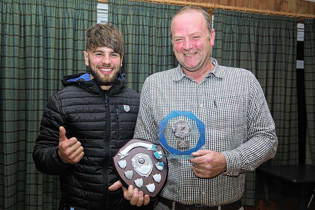 Jay Mackay (right) is presented with the Senior Max 177 title by Lewis Mackinnon at the NoSKC end-of-season awards at Golspie Golf Club. Photo Kenne Mackenzie