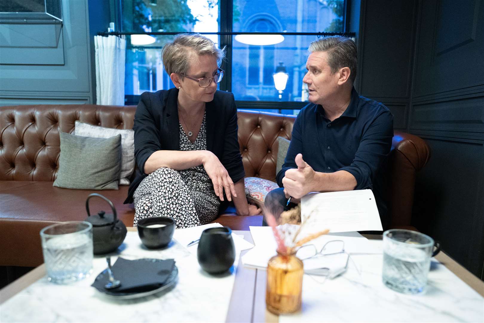 Labour leader Sir Keir Starmer and shadow home secretary Yvette Cooper work in their hotel in The Hague (Stefan Rousseau/PA)