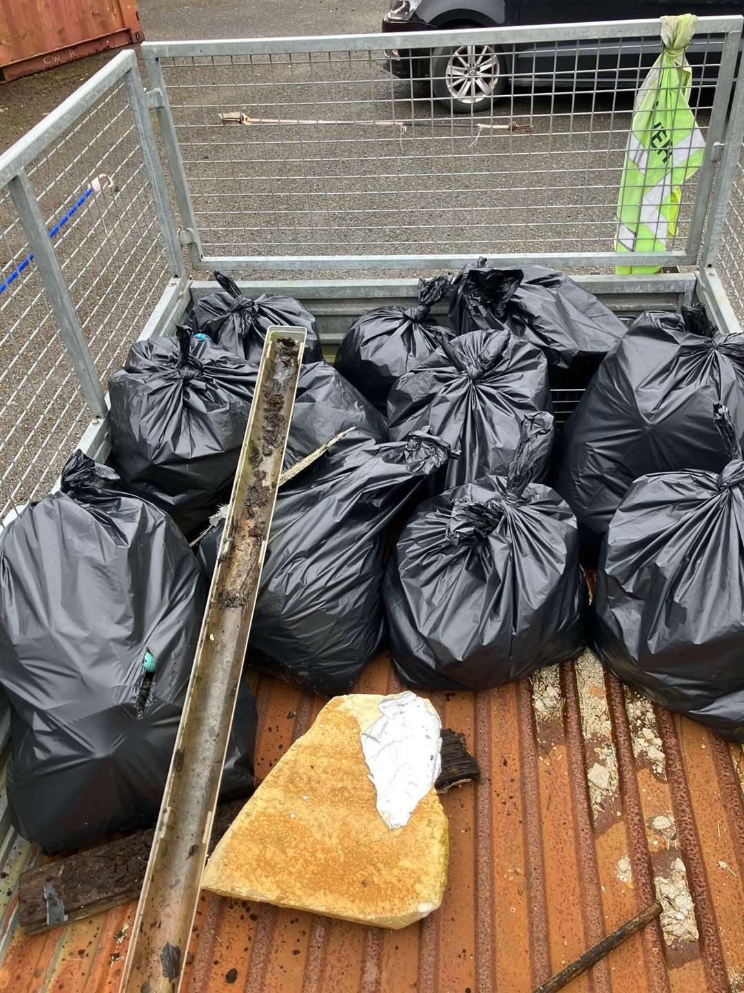 Some of the bags of rubbish along with miscellaneous items removed by the volunteers. Picture: Allan Bruce