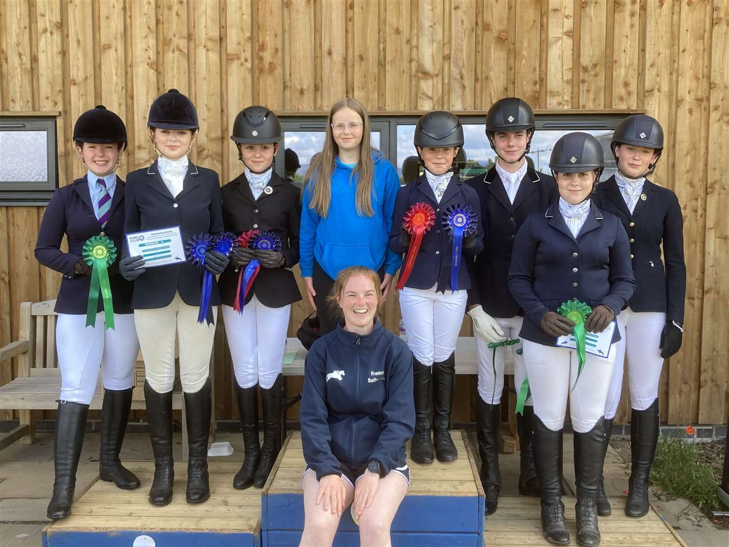 All the riders who took part, along with coach Frances Sutherland (front), after the dressage prize-giving.