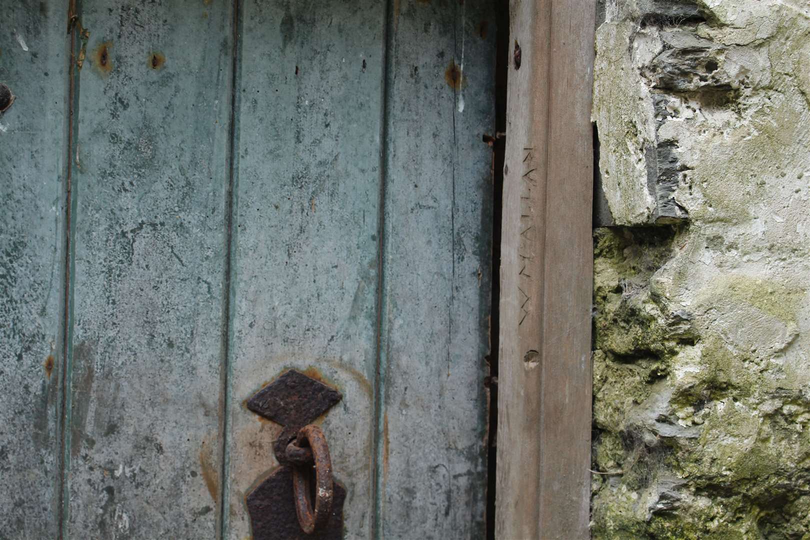 Graffiti reading “W McAllan” on the connecting door. Picture: John Davidson