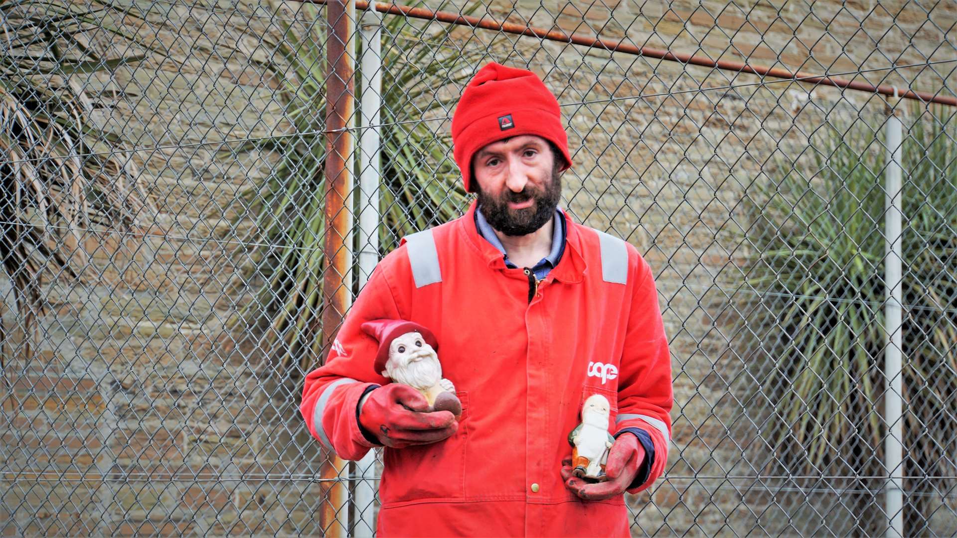 Community activist Alexander Glasgow with his little gnome helpers. Picture: DGS