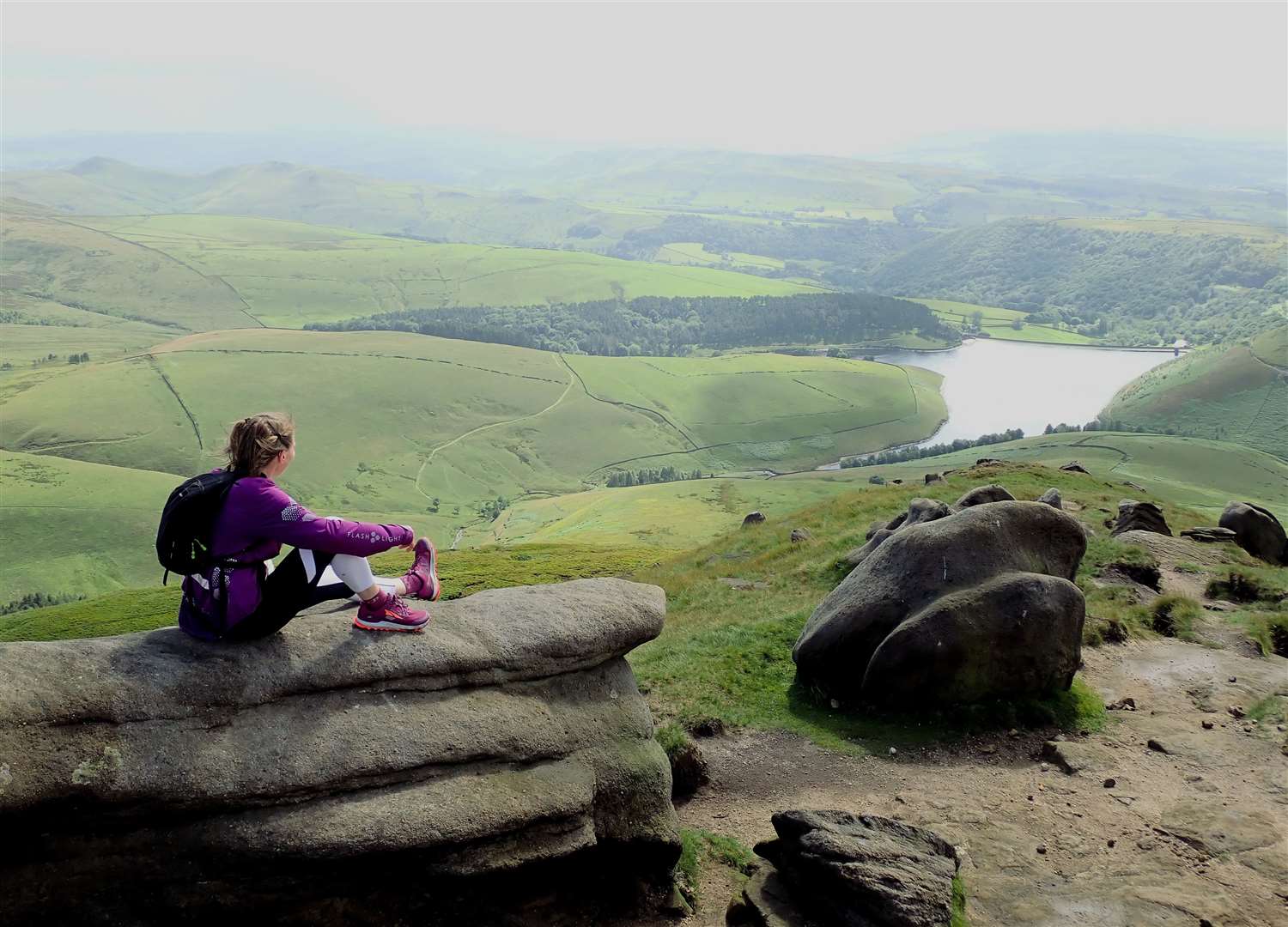 Meg takes a break on the plateau overlooking Kinder Reservoir.