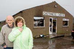 Sandy and Sandra Sutherland outside their burnout Caithness Cheese factory at Occumster. Photo: Robert MacDonald.