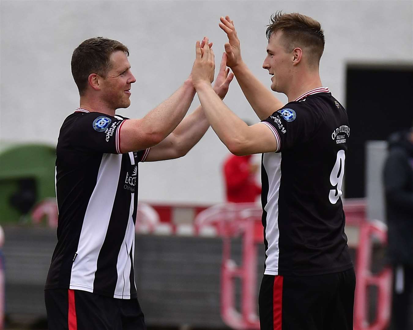 Davie Allan congratulates Steven Anderson after the latter made it 2-0 to Wick Academy in last Saturday's game against Deveronvale. Picture: Mel Roger