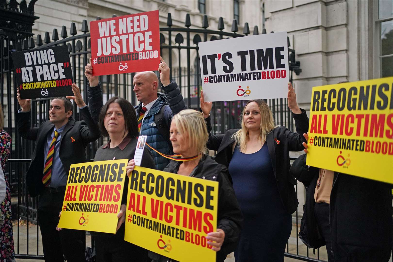 Families protest outside Downing Street (Victoria Jones/PA)