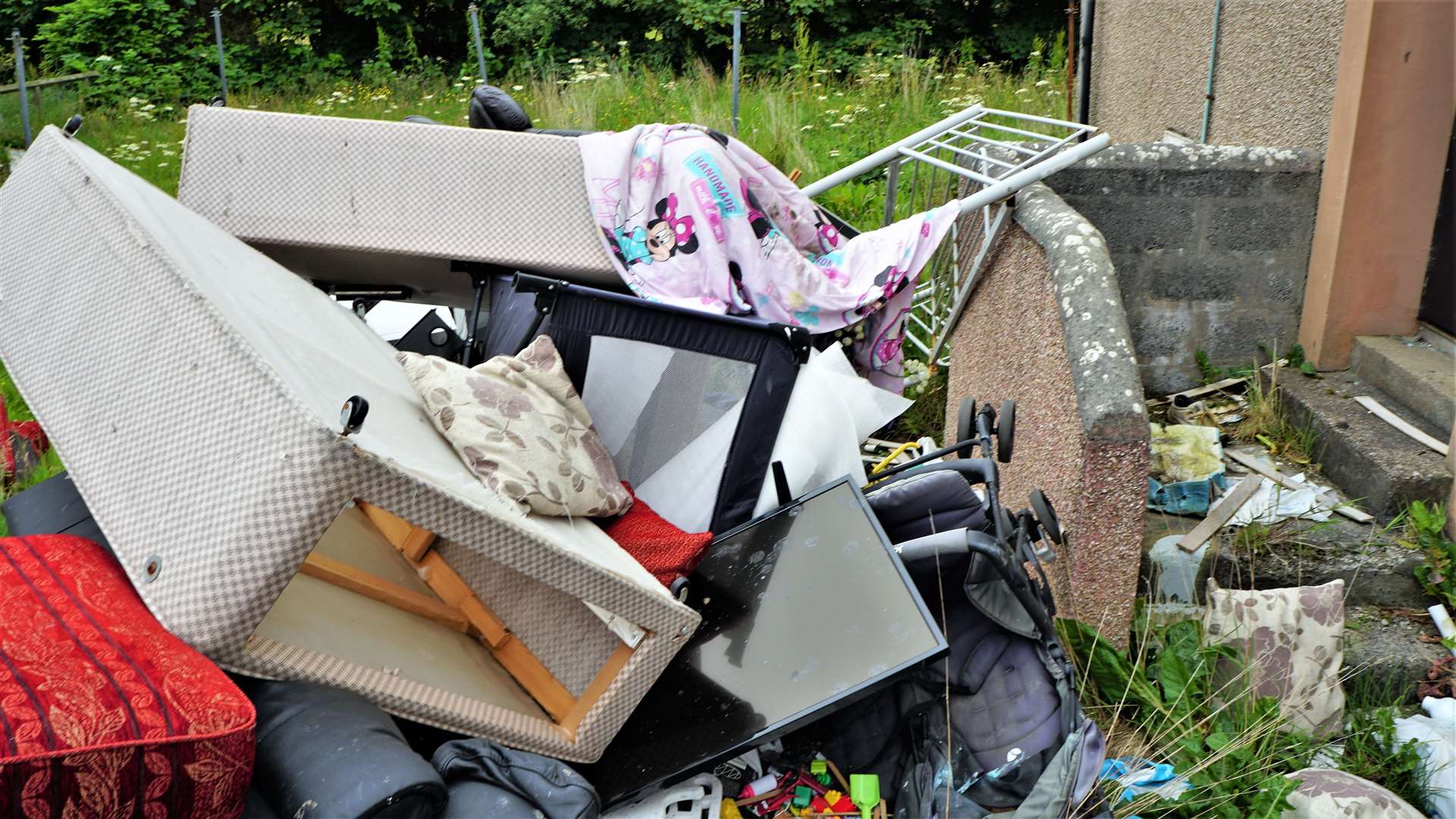 The flats at Kennedy Terrace in Wick have become a dumping ground for fly-tippers. Pictures: DGS