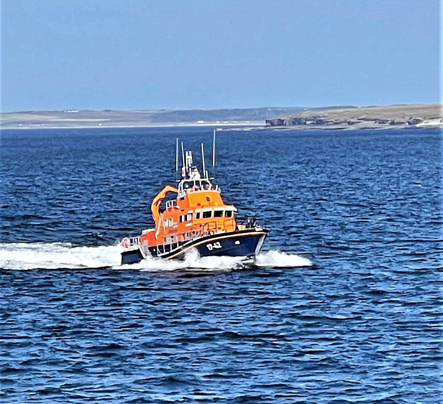 Thurso lifeboat goes to the aid of kayakers near Duncansby Stacks.
