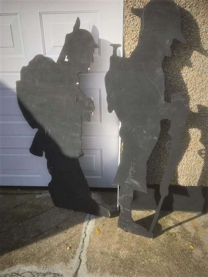A close-up of a couple of silhouettes.