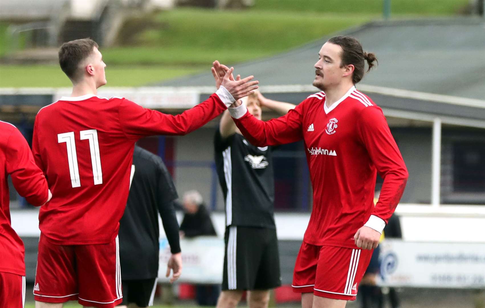 James McLean is congratulated by Aaron Wilson after Thurso's opener. Picture: James Gunn