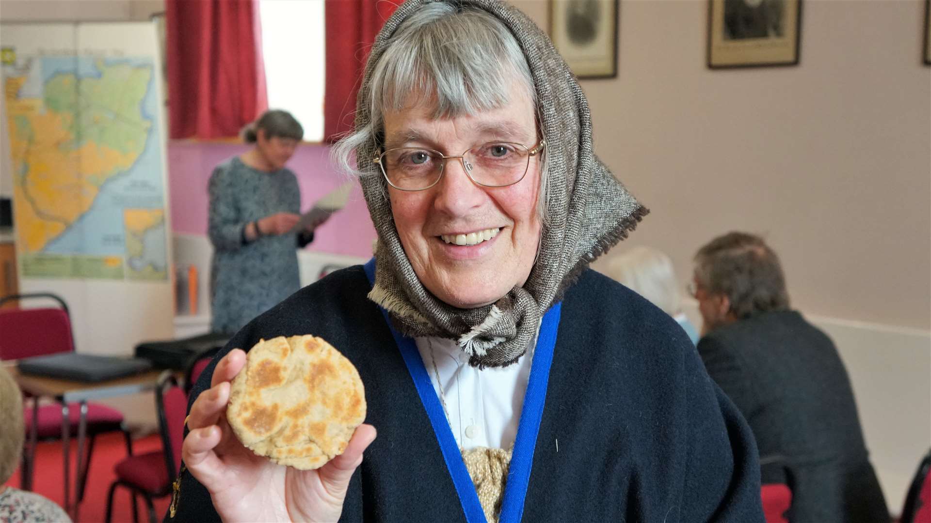 Jane Coll, secretary of the Northern Pilgrims' Way Group, with a traditional beremeal bannock she had specially baked for the event. Picture: DGS
