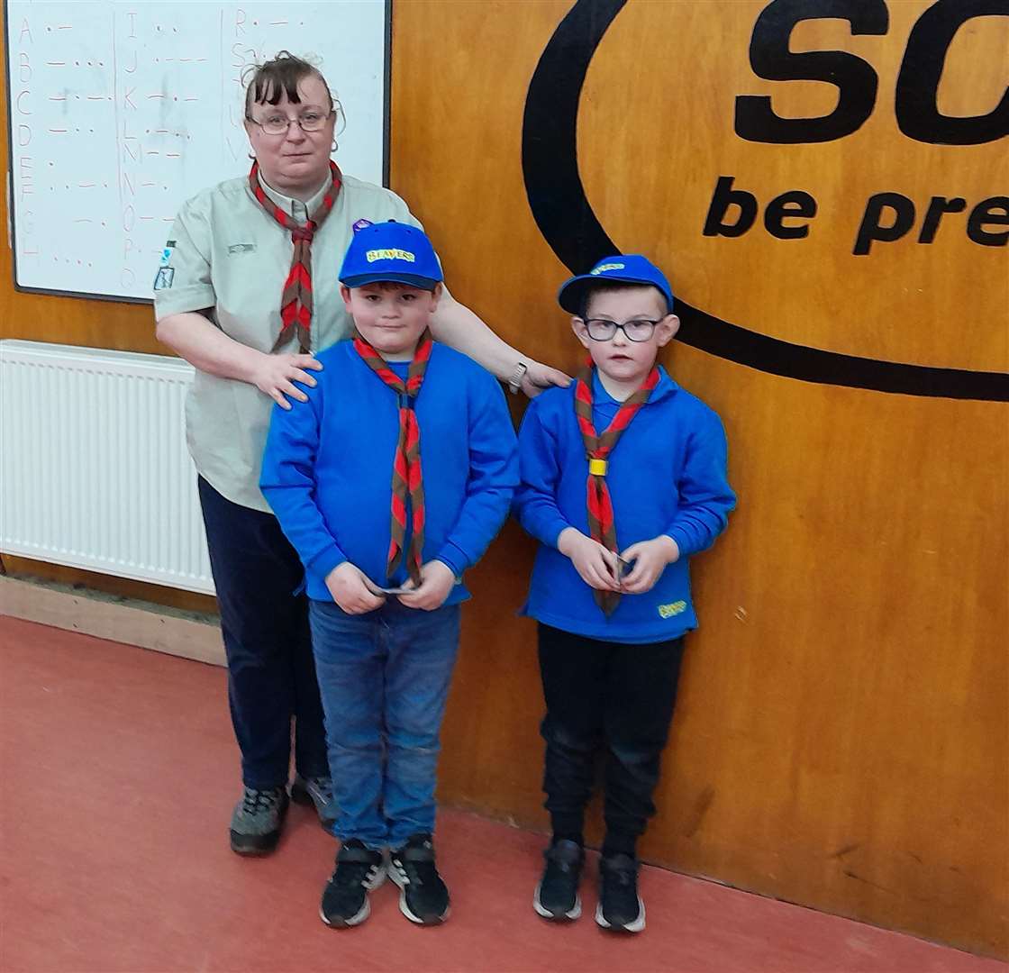 Beaver Leader Christine Waples with new Beavers Jack Bisset and Harry Davidson (right).