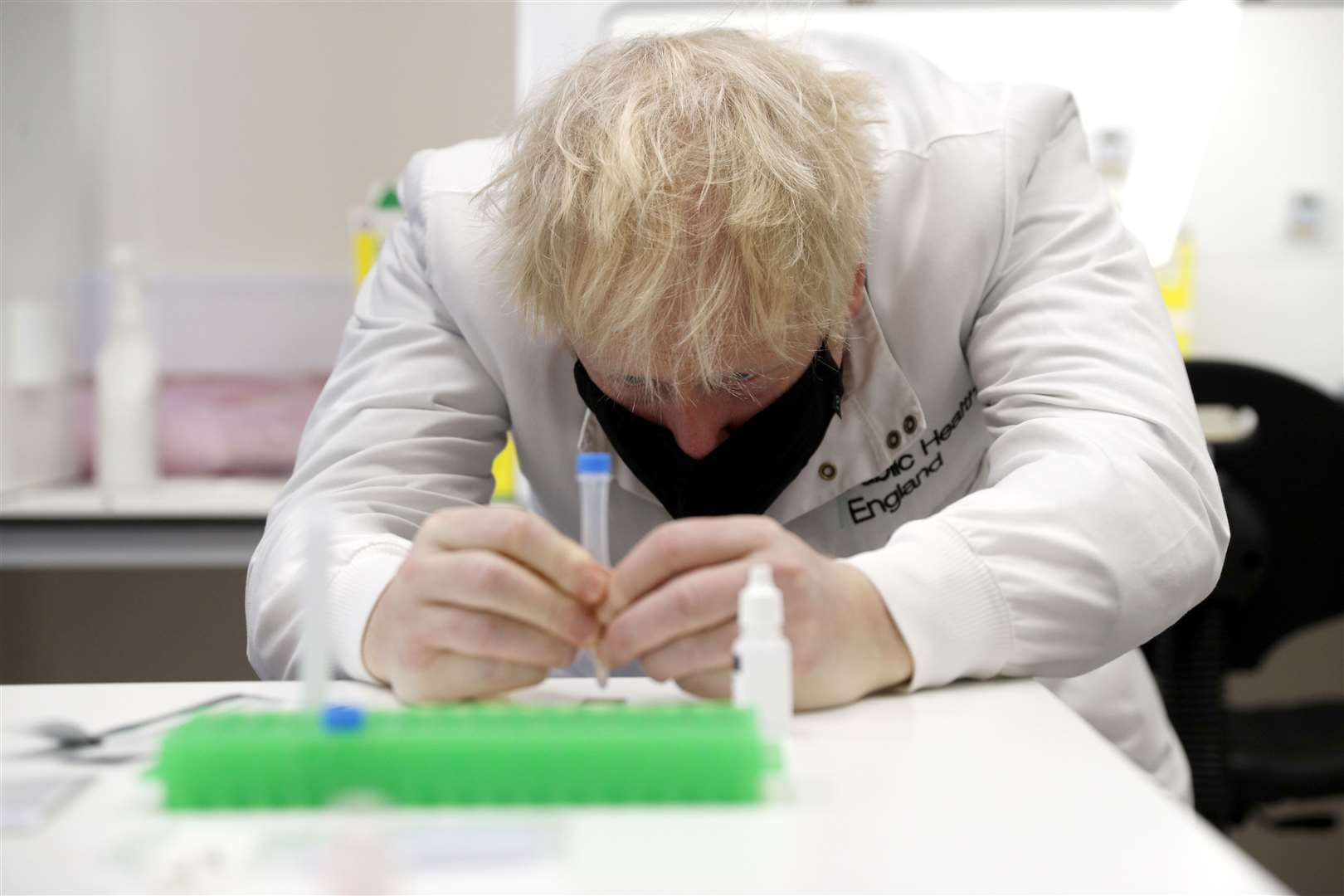 Boris Johnson visits Public Health England’s lateral flow testing laboratory at Porton Down in Wiltshire (Adrian Dennis/PA)