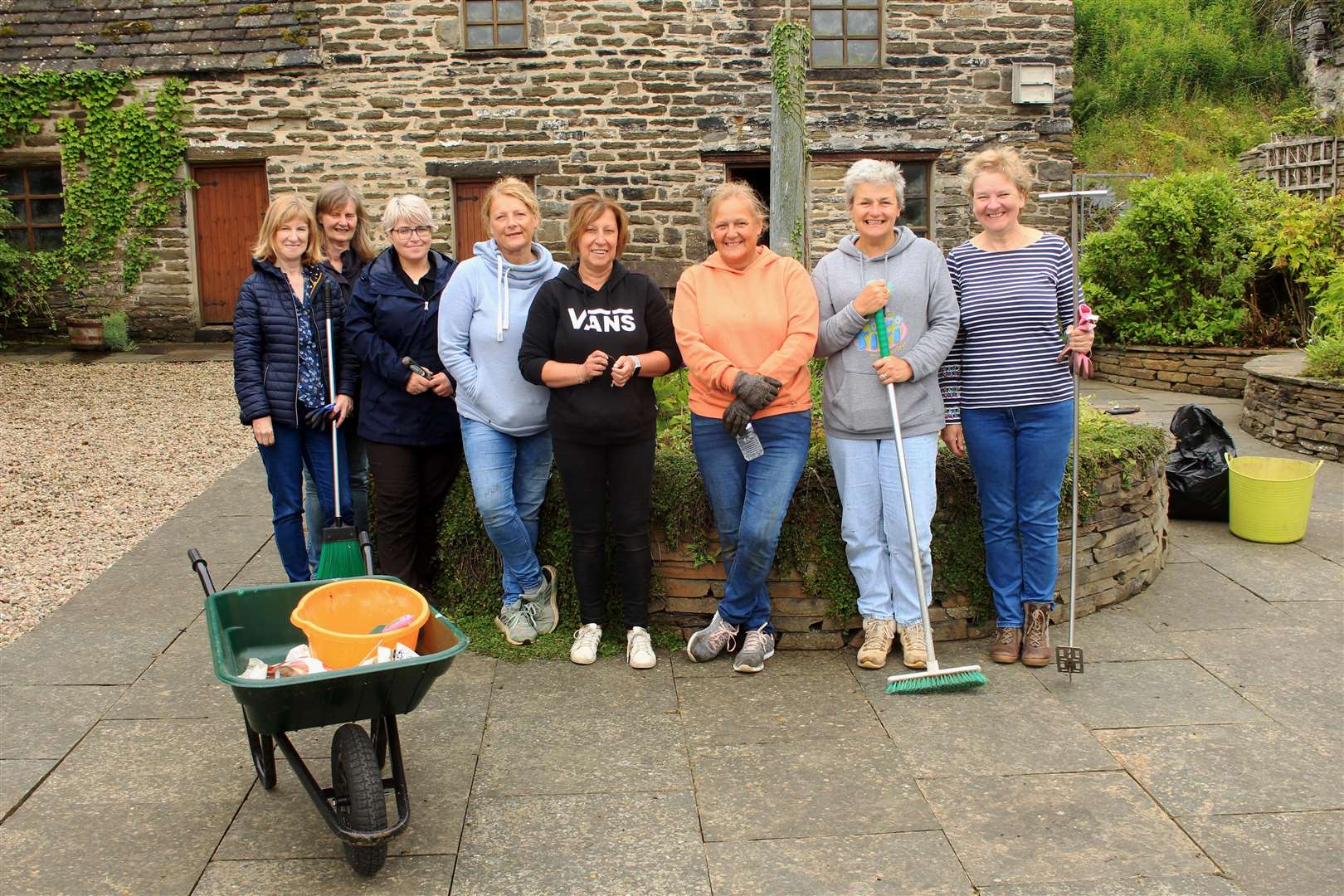 Some of the volunteers from Wick Paths Group and the flower baskets committee who took part in the memorial garden tidy-up on Sunday.