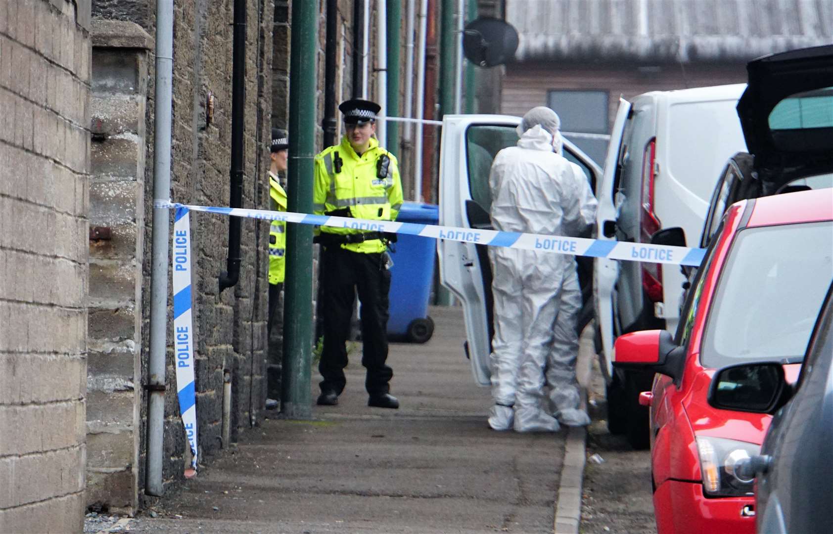 Police attending the scene at Wick's Barrogill Street on Sunday. Picture: DGS