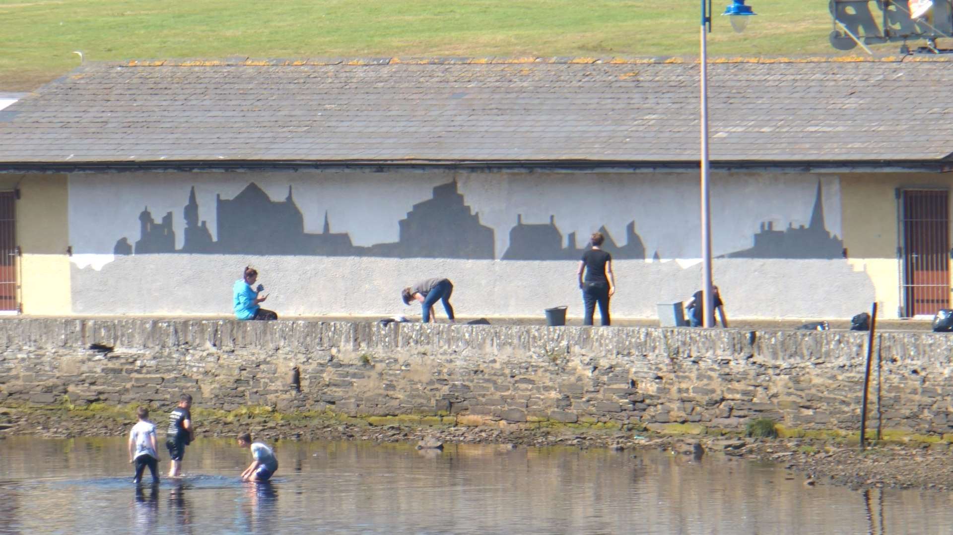 The first stage of the mural was completed while Wick basked in soaring temperatures on Tuesday.