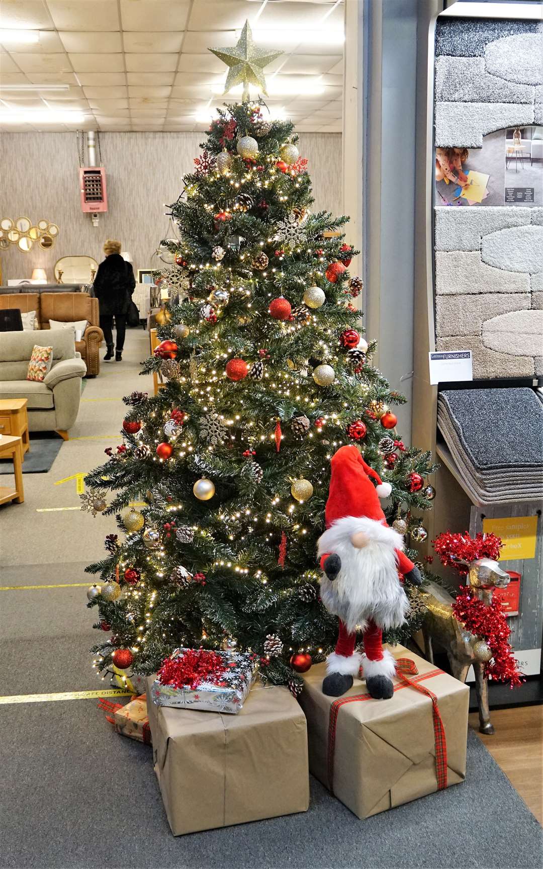 A gonk and a Christmas tree in Caithness Furnishers. . Picture: DGS