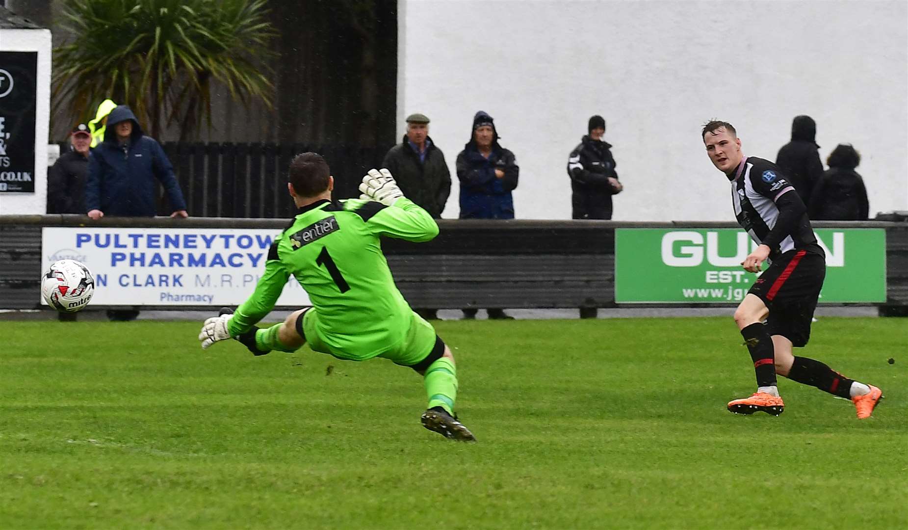 Wick Academy's Steven Anderson places the ball beyond Fraserburgh keeper Paul Leask for his second goal. Picture: Mel Roger