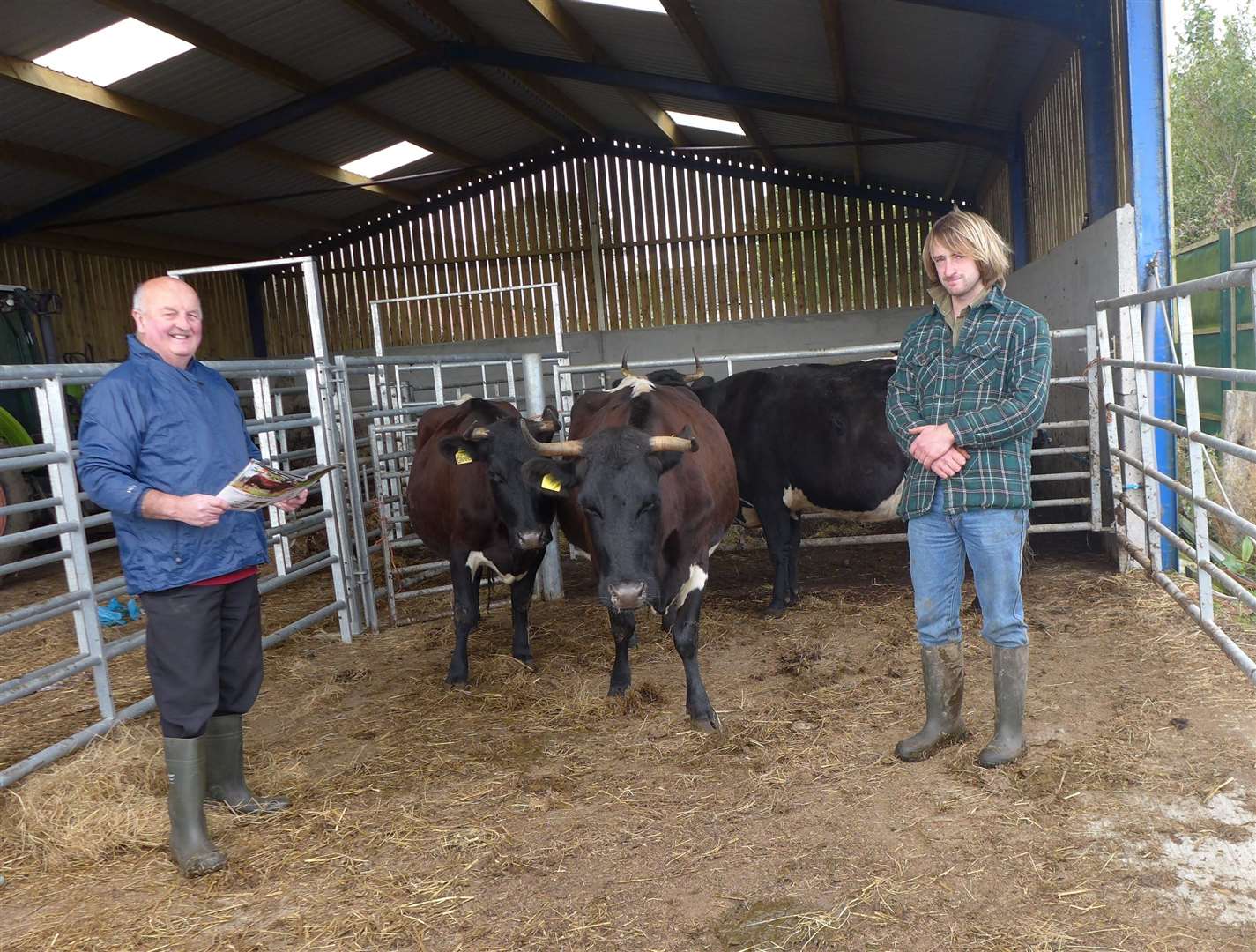 AI technician Willie Mackay (left) discusses the insemination programme with Sam Wybrew at Oldhall House Farm, Watten.