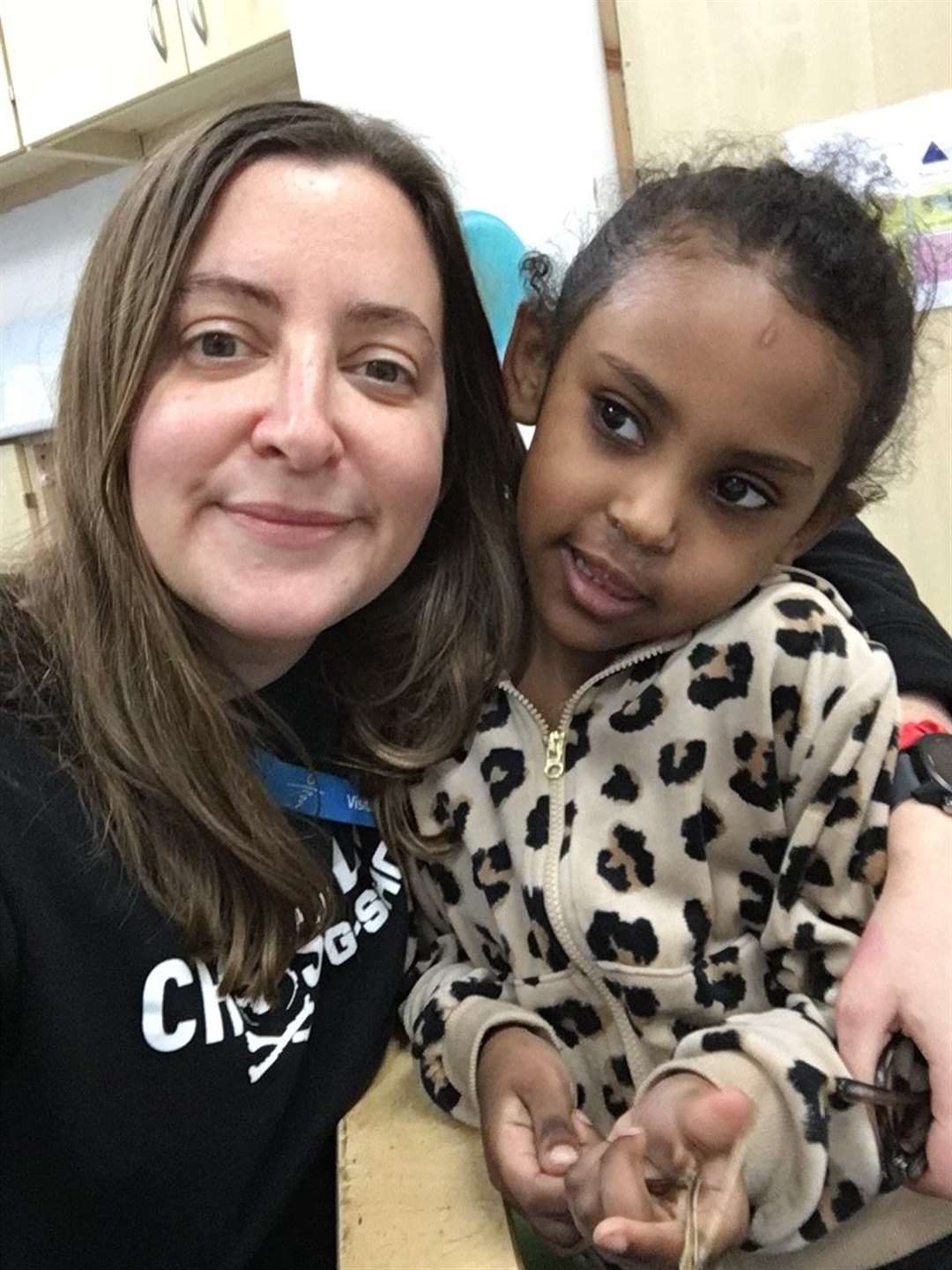 Charlotte Jones with five-year-old Malika (Handout/PA)
