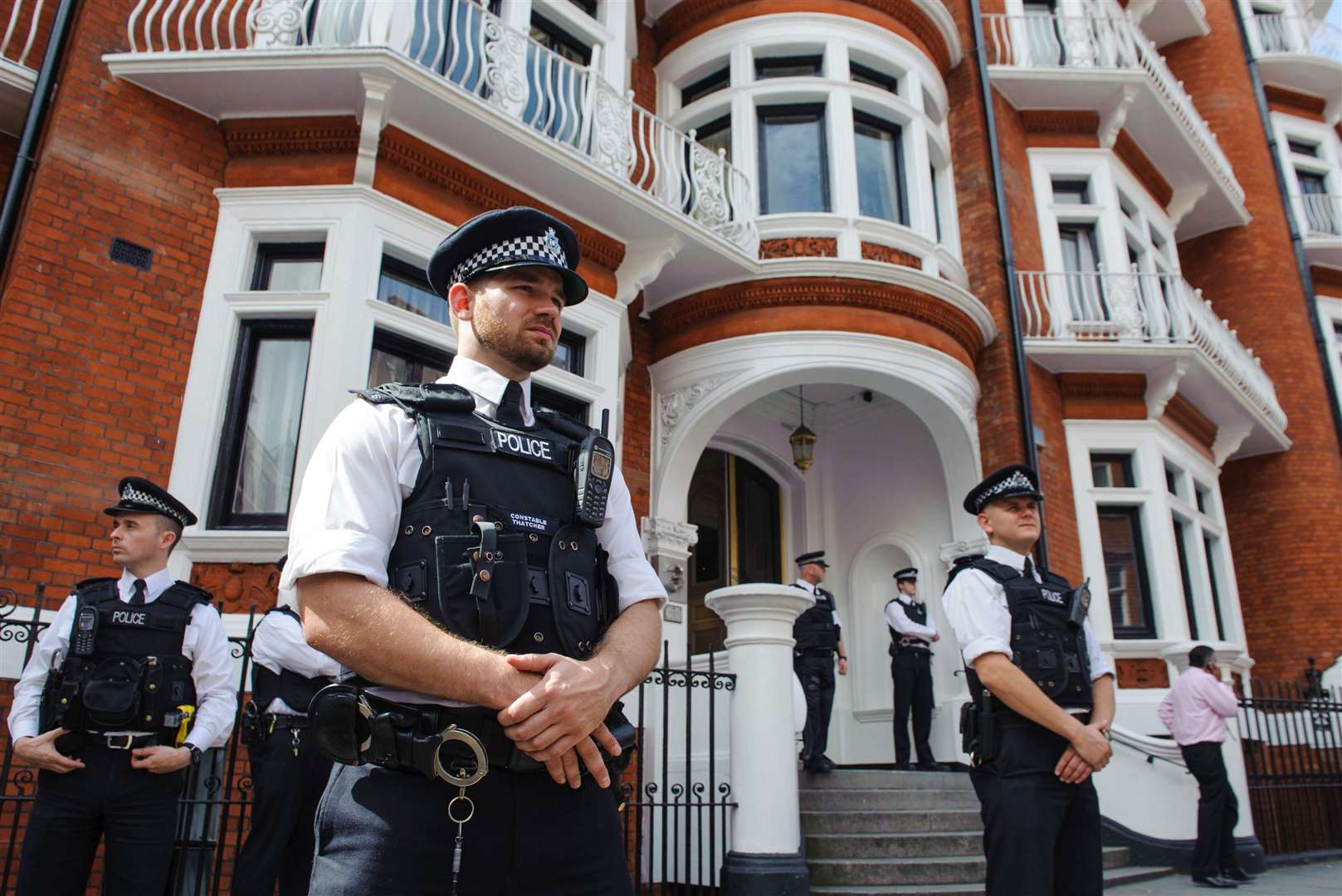 Police officers outside the Ecuadorian embassy in Knightsbridge, central London, where WikiLeaks founder Julian Assange stayed from 2012 (Dominic Lipinki/PA)