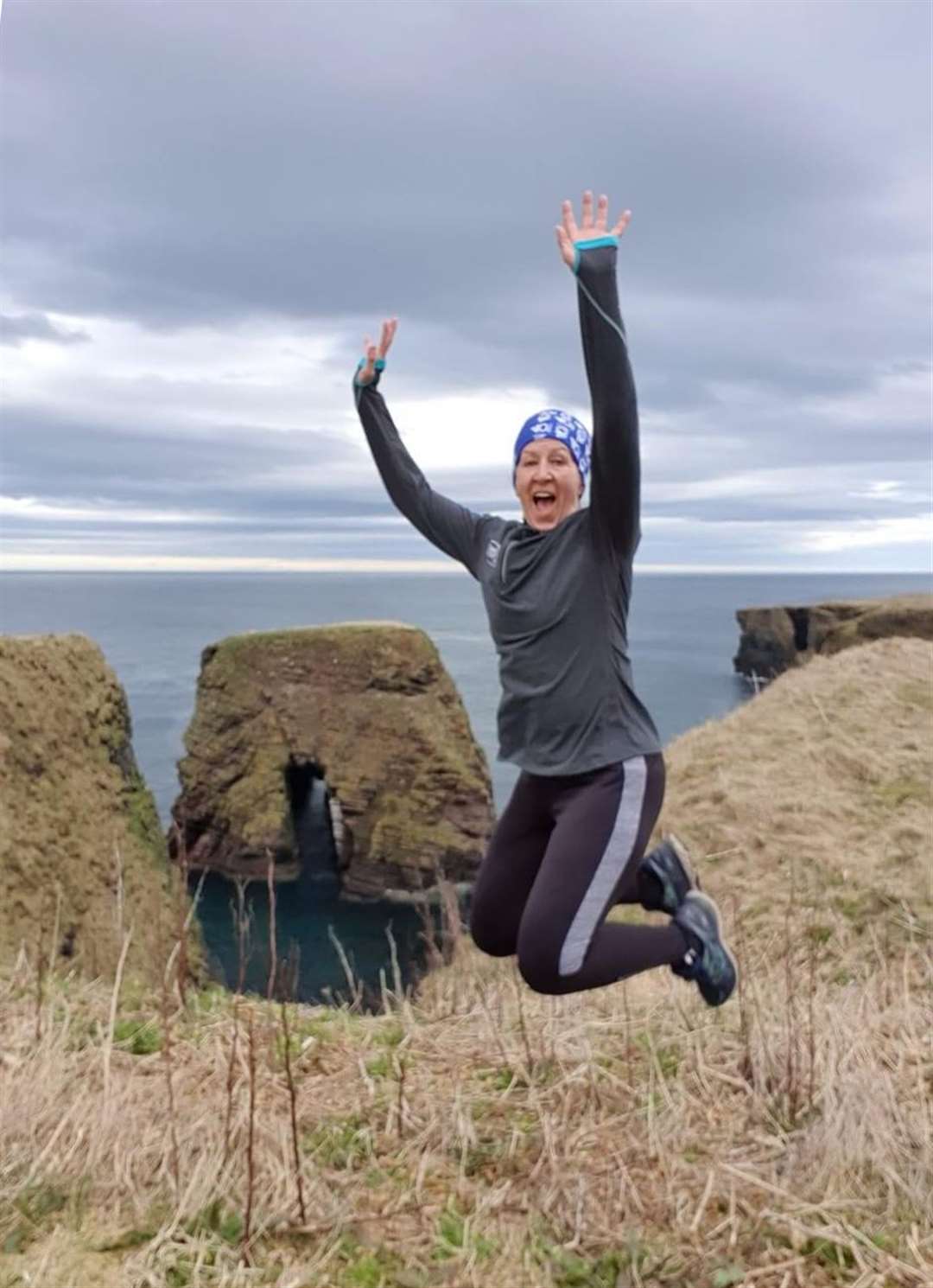 Fiona Bremner leaping high for a selfie during her daily exercise near Wick.