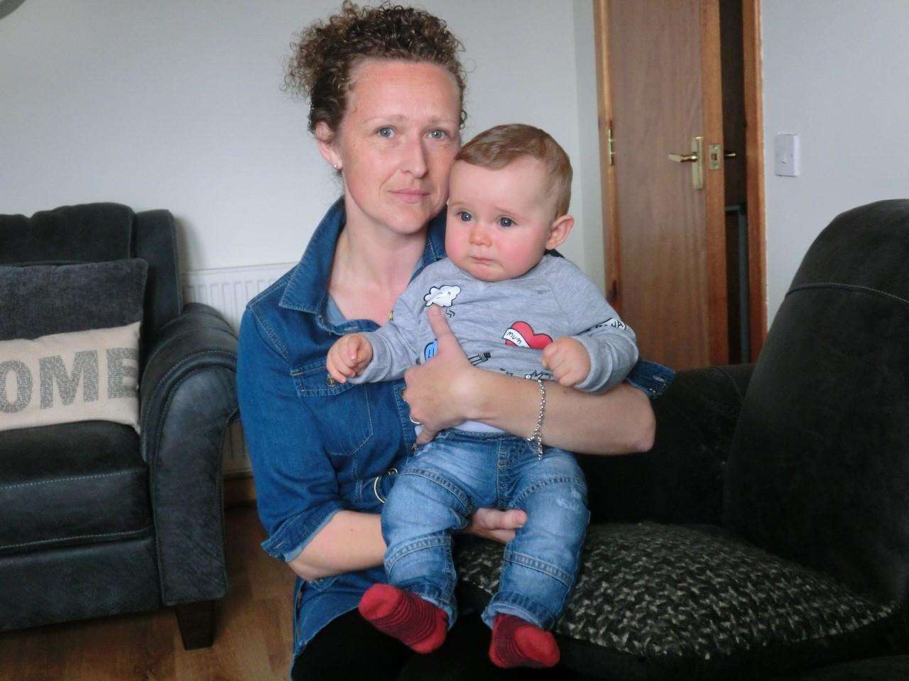 Liz Redmond at home in Wick with son Danny eight months after travelling in an ambulance to Inverness in stormy conditions. Photo: Will Clark