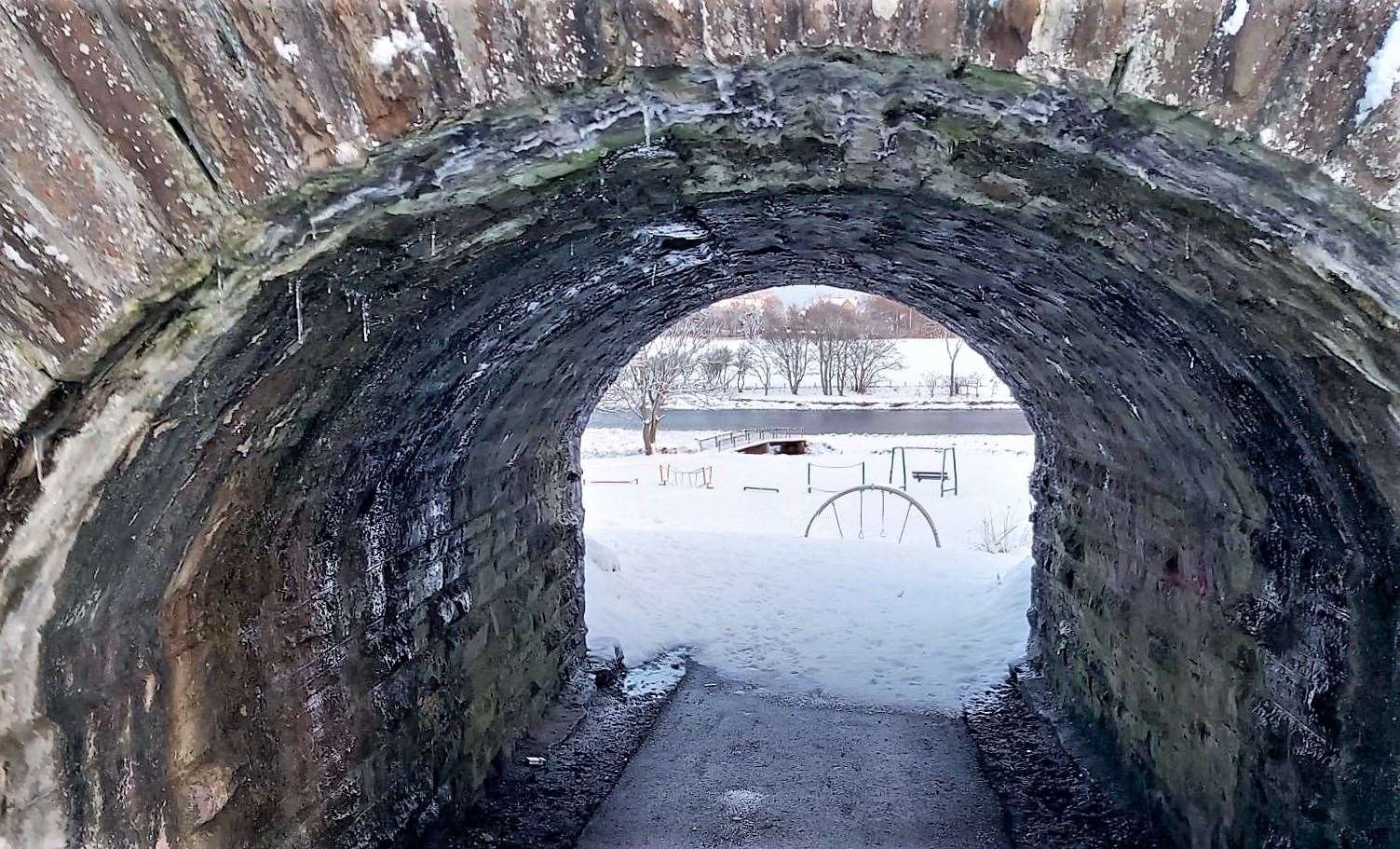 Icicles hang from the rail tunnel at Wick riverside. Picture: Derek Bremner