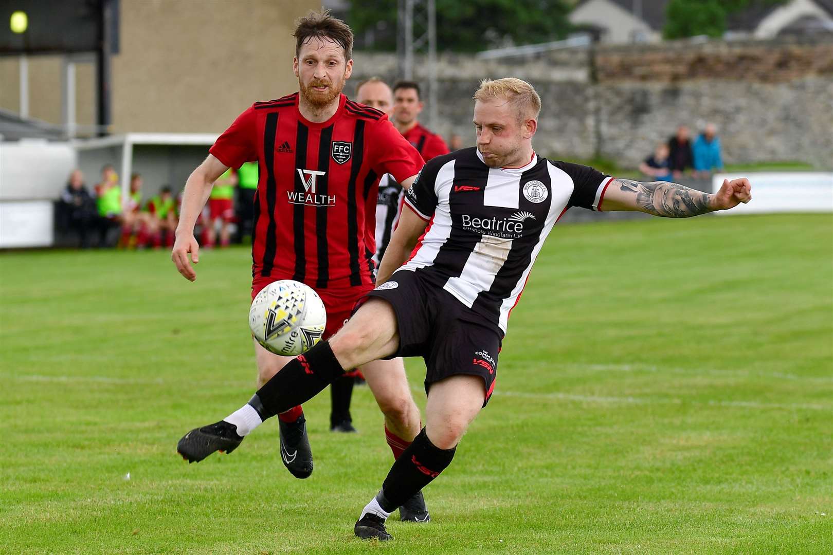 Wick's Alan Hughes clears the ball in his first competitive match since returning from injury. Picture: Mel Roger