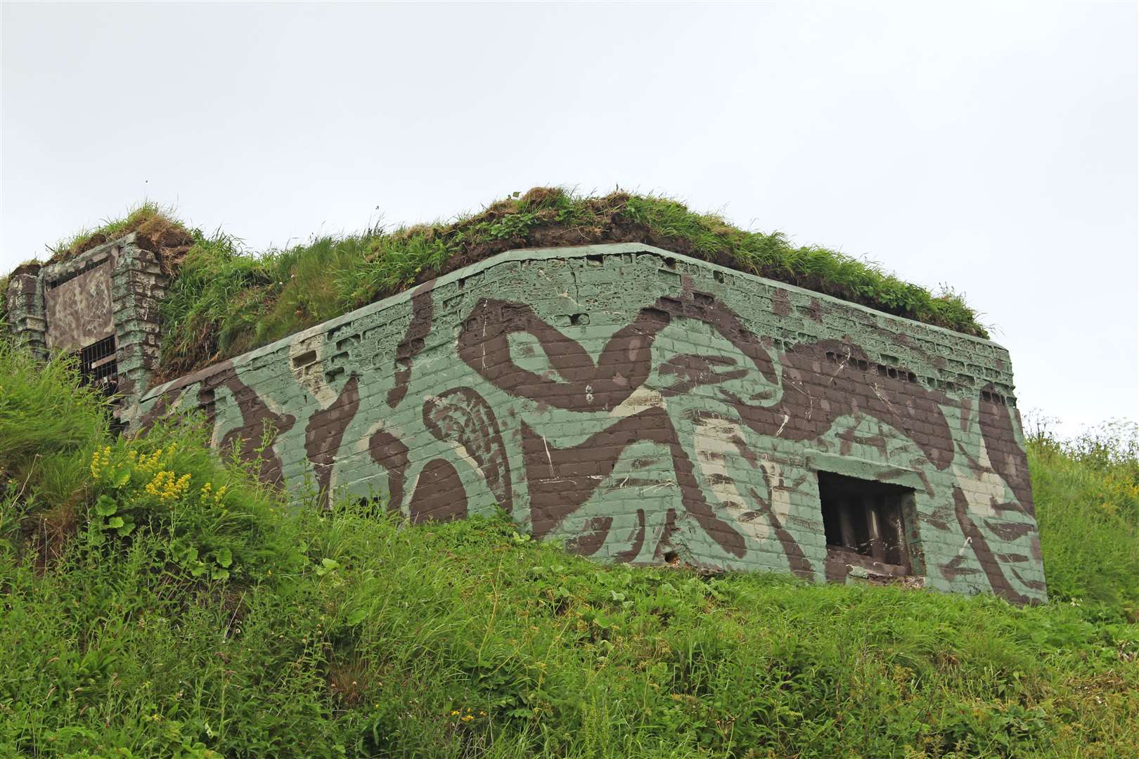 The defensive pillbox above the North Baths with its camouflage paintwork.