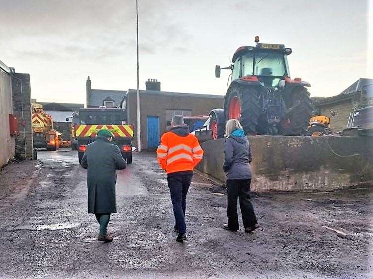 Caithness Roads Team has been praised by the council. Cllr Davidson (left) on Caithness roads depot visit in Wick.