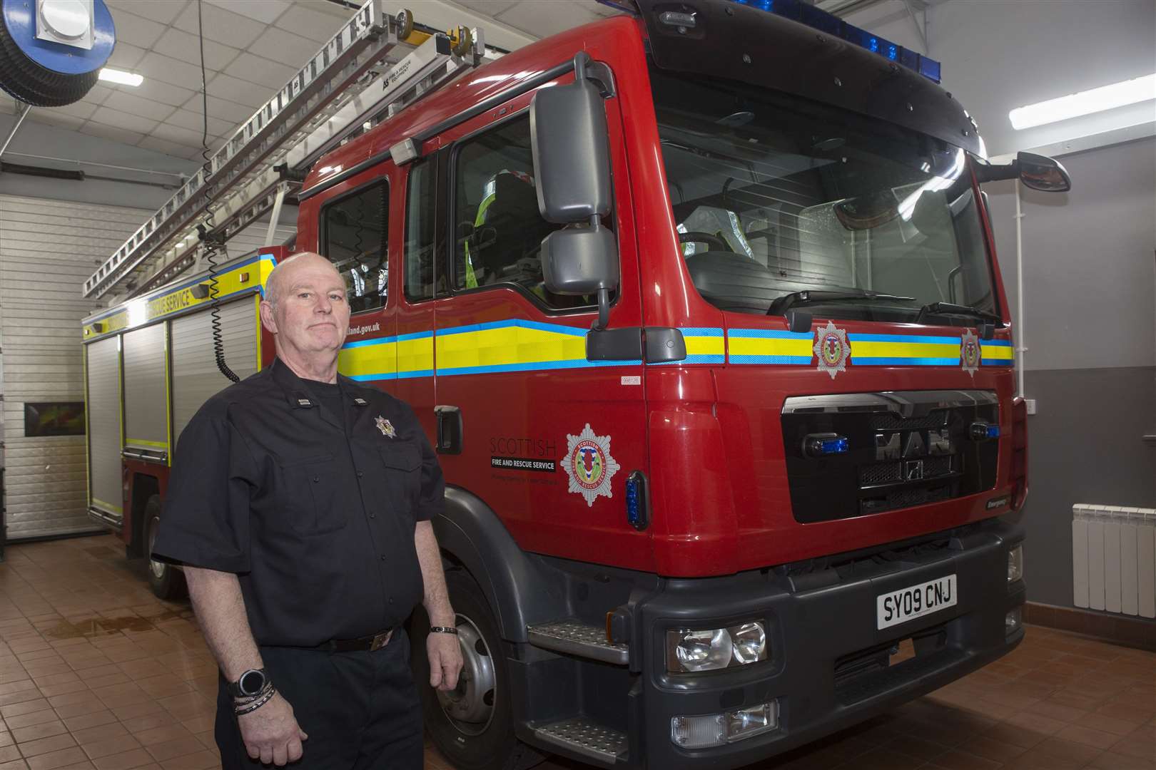 Richard Mackay, seen in Wick Fire Station on his last day in uniform, retired after 42 years with the fire service at Wick. Picture: Robert MacDonald/Northern Studios