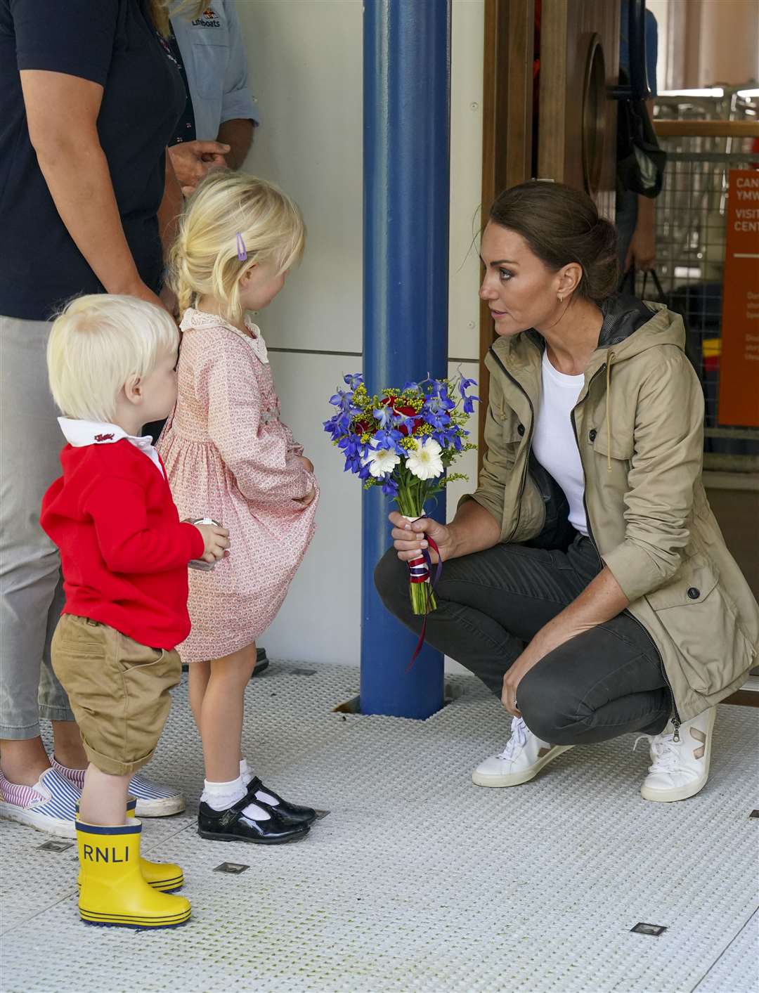 The Princess of Wales speaking to young children during a visit to the RNLI lifeboat station at St Davids (Arthur Edwards/The Sun/PA)