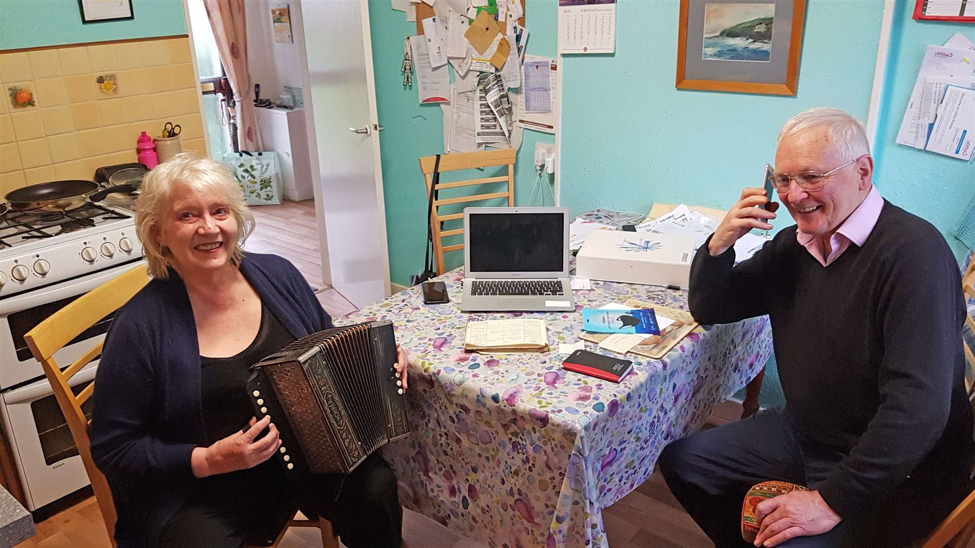 Nancy Nicolson and macular support group chairman Eric Farquhar preparing to link up for the third virtual ceilidh held in Eric's home in Wick.