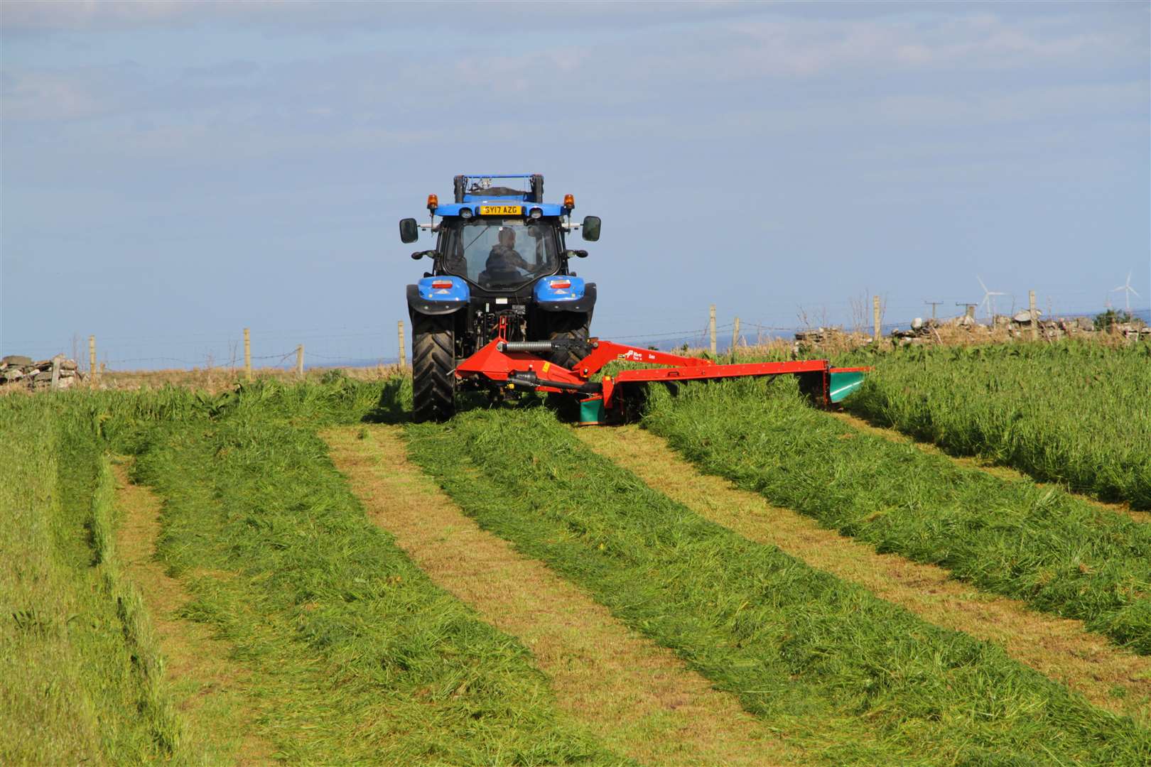 Agricultural contractor Euan Grant makes his way up a field at Occumster. Picture: Willie Mackay