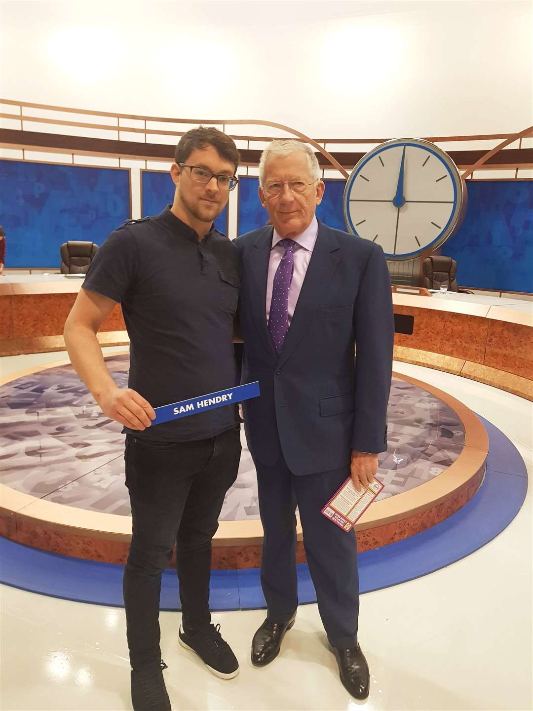 Sam Hendry with presenter Nick Hewer in the Countdown studio.