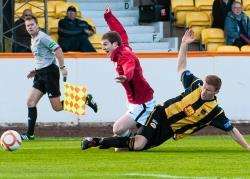 Penalty missed: Scorries skipper Sam Mackay failed from the spot after Davie Allan was taken down in the box by Berwick’s Dougie Bryden early in Saturday’s Scottish Cup second round clash at Shielfield Park. Picture: Melanie Roger