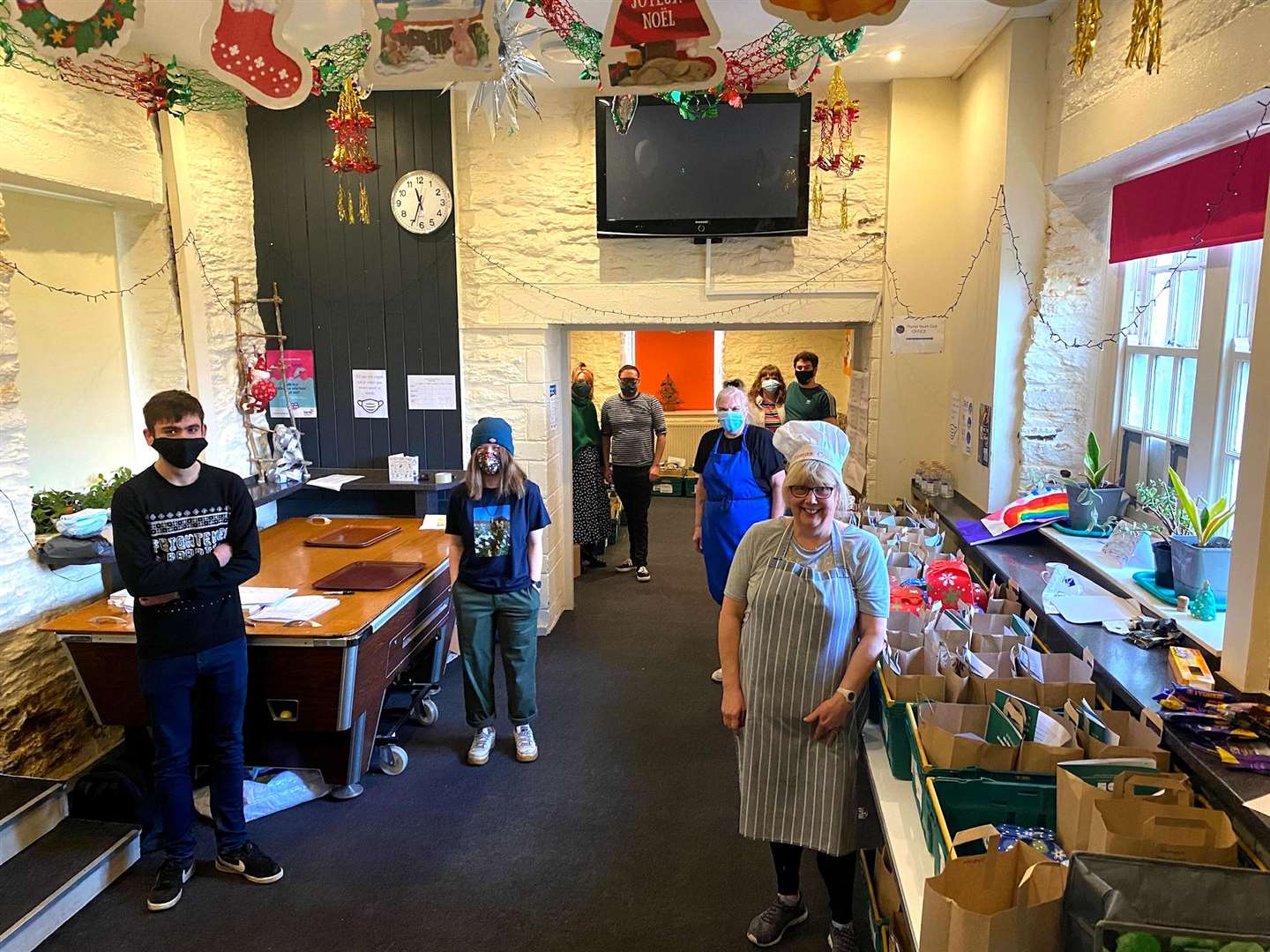 Volunteers on the day cooking and serving. Pictured (from left to right) are Sean Simpson, Jodi Budge, Zoe Mackenzie, Alister Allan, Bethany Lawrie, Tony Mayberry, Helen Allan and cook Lynda Moran.