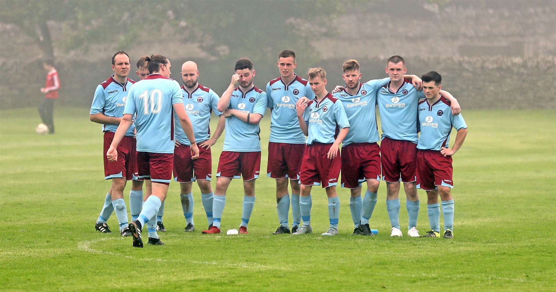 Pentland United's James Maclean walks back to his team mates after his penalty miss against Wick Groats which proved pivotal as his side lost the shootout, and the Highland Amateur Cup semi-final. Picture: James Gunn
