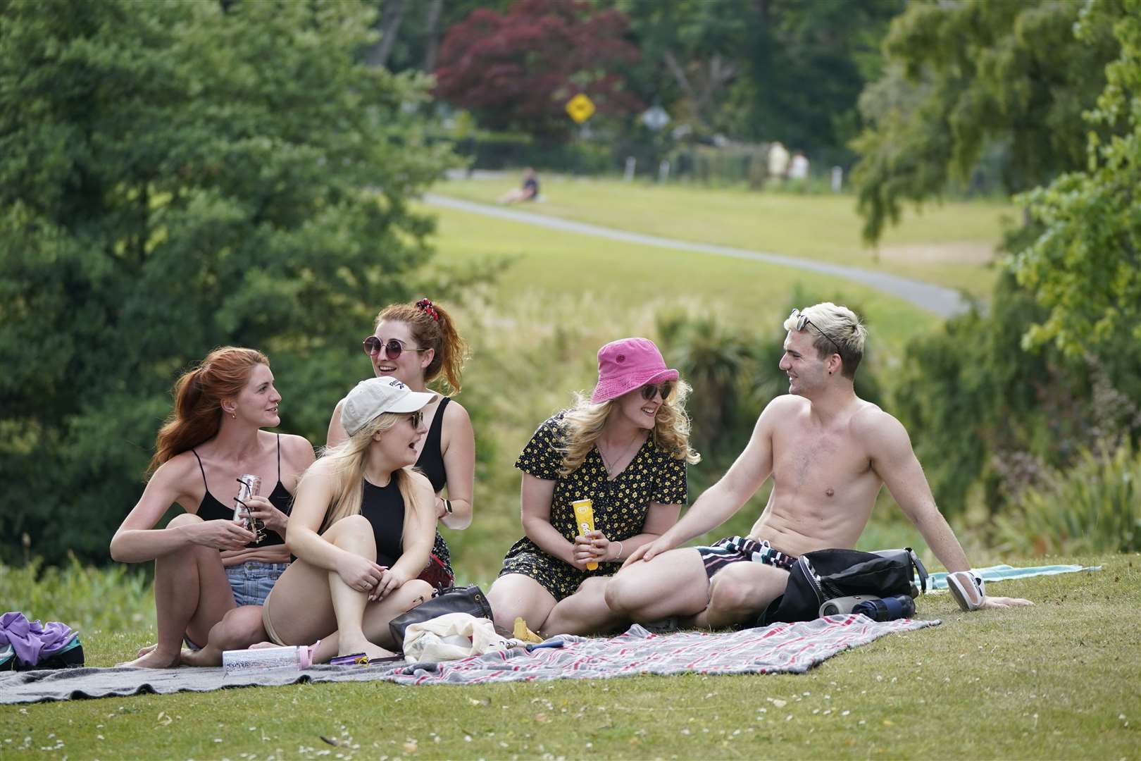 People in Phoenix Park in Dublin on the hottest day of 2022 (PA)