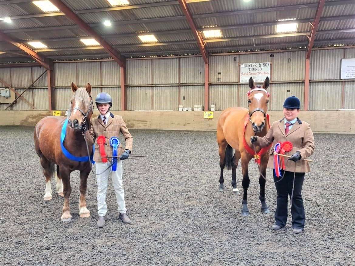 In hand champion Kimmy Lai with Ashlea's Hollywood Showgirl (right) and reserve Liam Mackenzie and Drymuir Bonnie Prince Charlie.