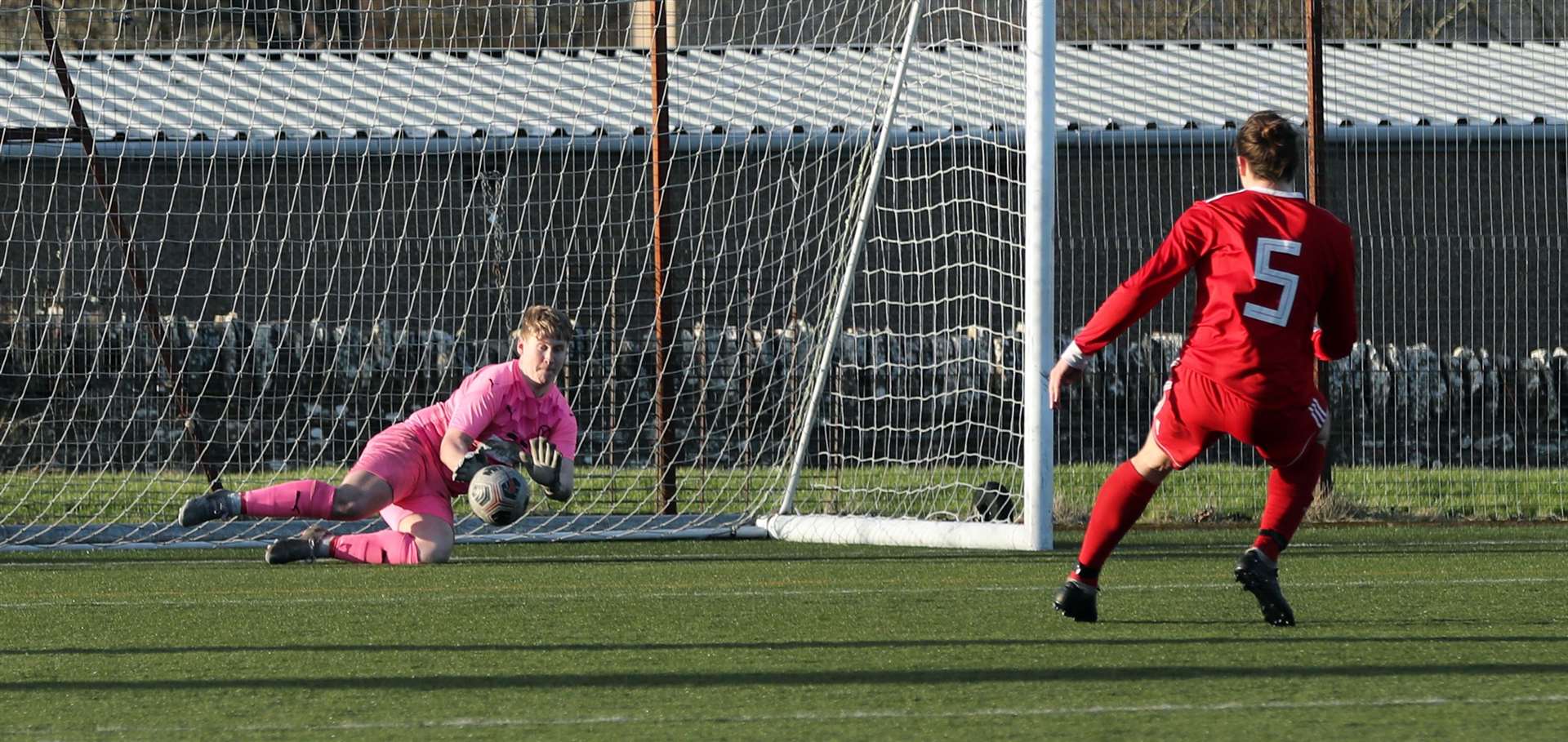 Keeper Gus Wilson saves a spot-kick by Thurso's James McLean to ultimately win the tie for Nairn County 'A'. Picture: James Gunn