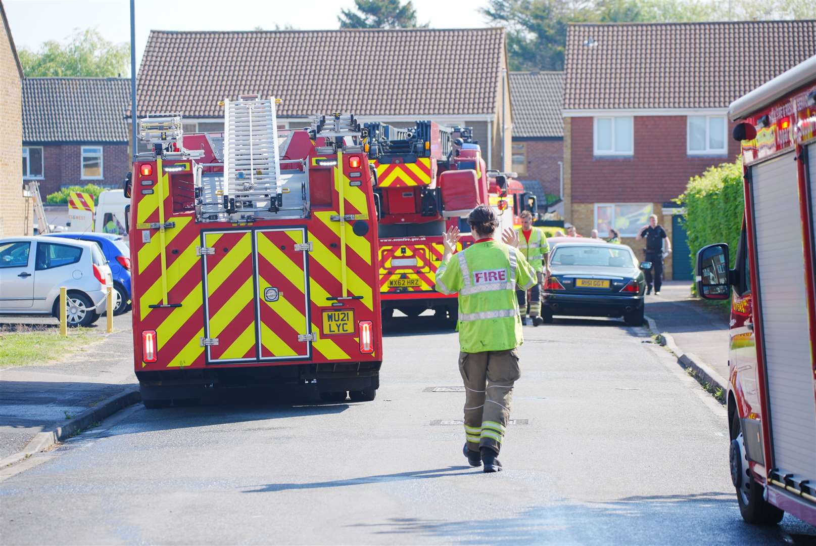 Fire engines and emergency workers at the scene on Lancaster Road in Yate (Ben Birchall/PA)
